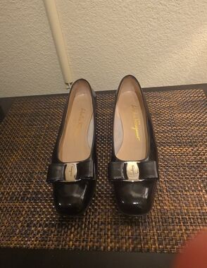 Salvatore Ferragamo Black Patent Vara Bow Flats with Gold Plaque